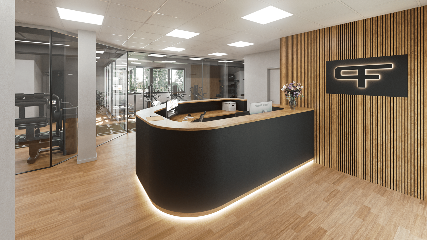 Moderner Empfangsbereich mit geschwungener Theke in Schwarz und Holz, beleuchtetem Logo an der Wand und Blick in den Trainingsraum mit Glasfront